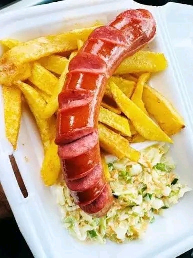 Sausage with chips and coleslaw